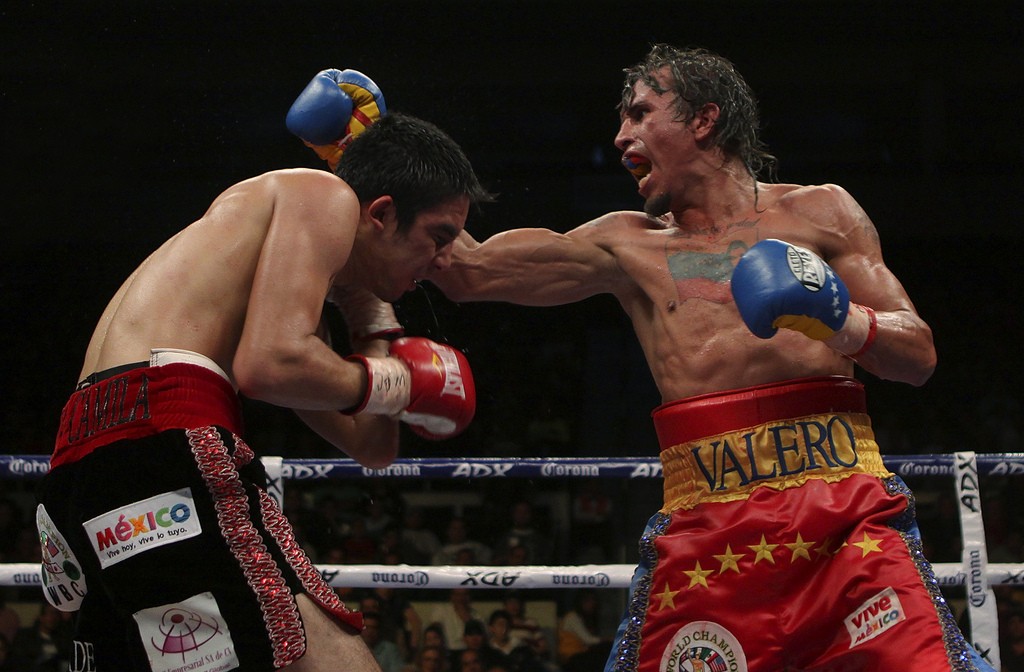 MONTERREY, MEXICO - FEBRUARY 6: Edwin Valero of Venezuela's (R) fights Antonio de Marco (L) of Mexico's for the absolute title of light weight of the World Council of Boxing (CMB) at The Arena Monterrey on February 6, 2010 in Monterrey, Mexico (Photo by Armando Marin/Jam Media/LatinContent/Getty Images)