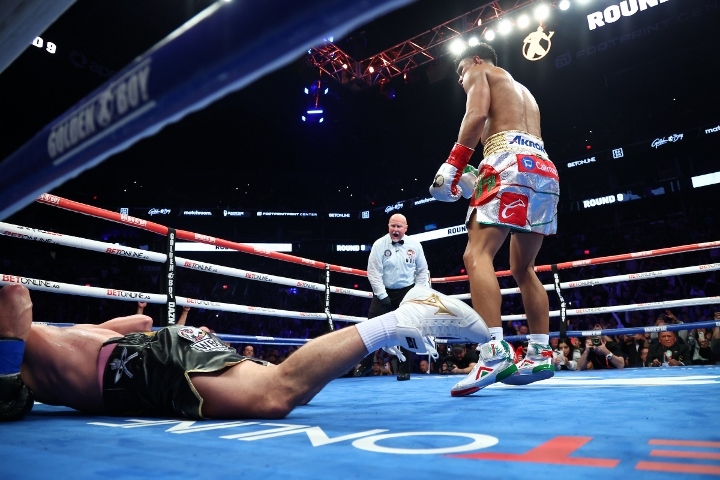 Phoenix, Arizona - In a super middleweight clash, former world champion Jaime Munguia (43-0, 34 KOs) dropped John Ryder (32-7, 18 KOs) four times to secure a stoppage in the ninth. (Photo by: Ed Mulholland)